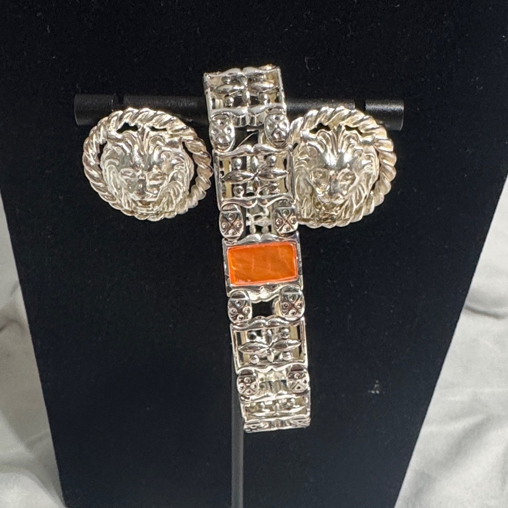 Silver Lion Head Bracelet with Orange Accent